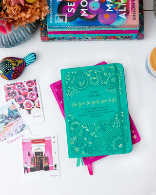 Inspirational Turquoise Twist 'Year to Ignite Your Light' Diary organiser by Intrinsic, filled with personal growth tools & motivational messages by Adèle Basheer.