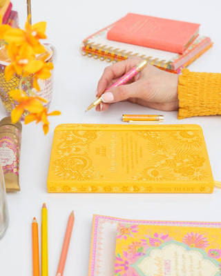 Intrinsic Limoncello yellow 'Year for Radiating Joy' Diary with soulful journaling prompts and inspirational quotes.