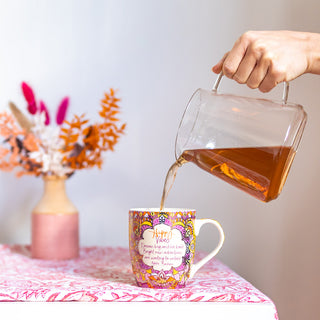 Bold and dreamy Happy Vibes ceramic tea mug with inspirational message by Adele Basheer. Designed in South Australia.