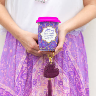 Bright coloured deep red key holder with vegan leather floral pattern and merlot red tassel. Featuring heartfelt quote by Adèle Basheer.