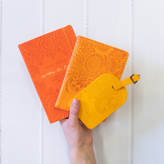 Intrinsic Luxe Faux Leather Travel Accessories with Inspirational Quotes- Bright orange Travel Journal, soft pastel orange passport wallet, yellow luggage tag