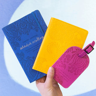 Intrinsic Luxe Faux Leather Travel Accessories with Inspirational Quotes- deep navy blue Travel Journal, yellow purple passport wallet, plum cherry purple luggage tag
