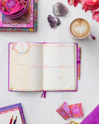 Week-to-a-view in the Intrinsic Berry Bliss 'Create Magic' Diary - with daily schedule, habit tracking, gratitude practice & inspirational quote by Adèle Basheer.