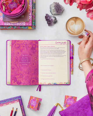 Reflect and plan ahead Quarterly Insights with guided journaling prompts, self-care focus & motivational messages by Adèle Basheer. In the Berry Bliss Year to Create Magic Intrinsic Diary Planner.