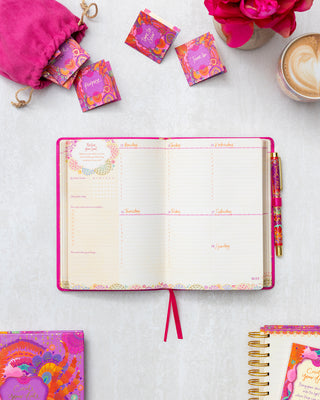 Weekly Organiser in the Intrinsic Berry Bliss 'Year to Create Magic' Diary Planner. Empowering habit tracker, gratitude practice & inspirational quote by Adèle Basheer.
 