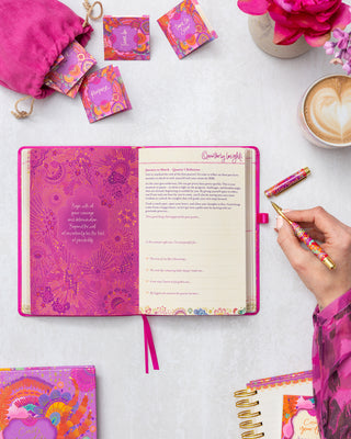 Inspirational quote from Adèle Basheer and guided journaling in the Quarterly Insights spread from the Intrinsic Berry Bliss 'Year to Create Magic'. Features journaling prompts for gratitude, self-care and goal-setting.