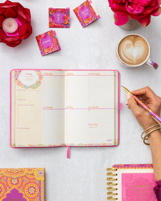 Look into the Weekly Planner magic for the Intrinsic Rose Quartz pink Year For You Diary - with daily planner, habit tracking, gratitude & inspirational message from Adèle Basheer.

