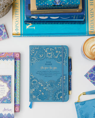Inspirational blue Year for You Diary organiser by Intrinsic with self-care and personal growth tools & motivational messages by Adèle Basheer.