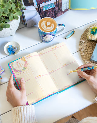 The magic of the Weekly Organiser in the Intrinsic 'Year to Ignite Your Light' Diary Planner in Turquoise Twist - with daily appointments, habit tracking, gratitude list & inspirational quote by Adèle Basheer.