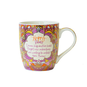 Intrinsic Happy Vibes ceramic coffee mug with motivational message and pink, yellow and purple illustrations