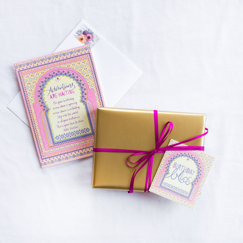 Intrinsic Birthday Bliss Gift Tag with blank inside. Unique colourful birthday gift label with gold foil and inspirational quote on cover by Adele Basheer. Beautiful, hand-illustrated swing tag for birthday celebrations, personalised gifts for someone’s special day and gift packs for birthday milestones.