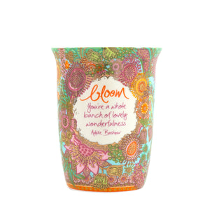 Intrinsic ceramic reusable travel and garden cup with multi-colour Australian native flowers, gold foiling and hot pink silicone lid. Featuring inspirational friendship quote by Adèle Basheer. 
