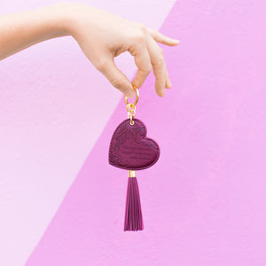 Love heart shaped Vegan Leather maroon, merlot red key ring with short inspirational quote. Key holder for house keys, car key, backpack, purse, school bag, gym bag, colour code spare key, shed key, key fob and USB.  