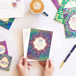 Intrinsic 'Stellar Wishes' motivation themed birthday and special occasion greeting card with envelope. Unique, colourful good luck card with gold foil and inspirational quote on cover by Adele Basheer. Greeting card for someone celebrating a milestone, birthday or new beginnings. 